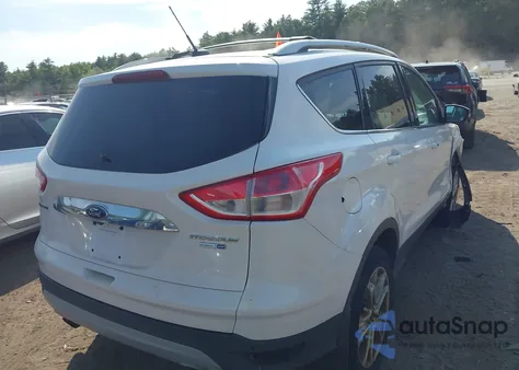 2014 Ford Escape Titanium z USA, uszkodzony, nr VIN 1FMCU9J94EUA01800